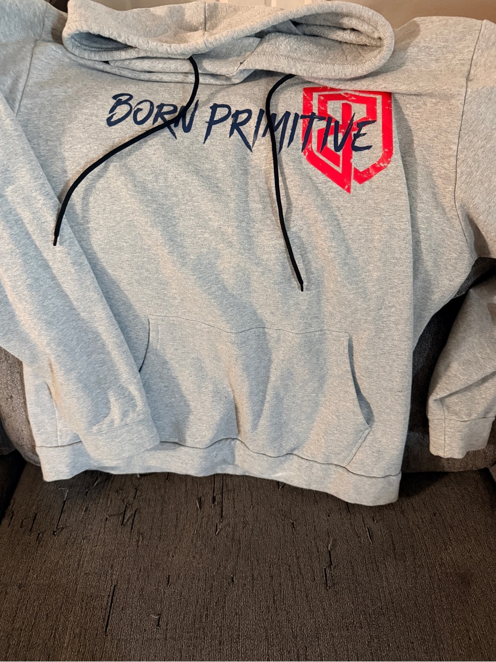 Born Primitive Men’s Light Gray Crewneck Hoodie with Red Shield
